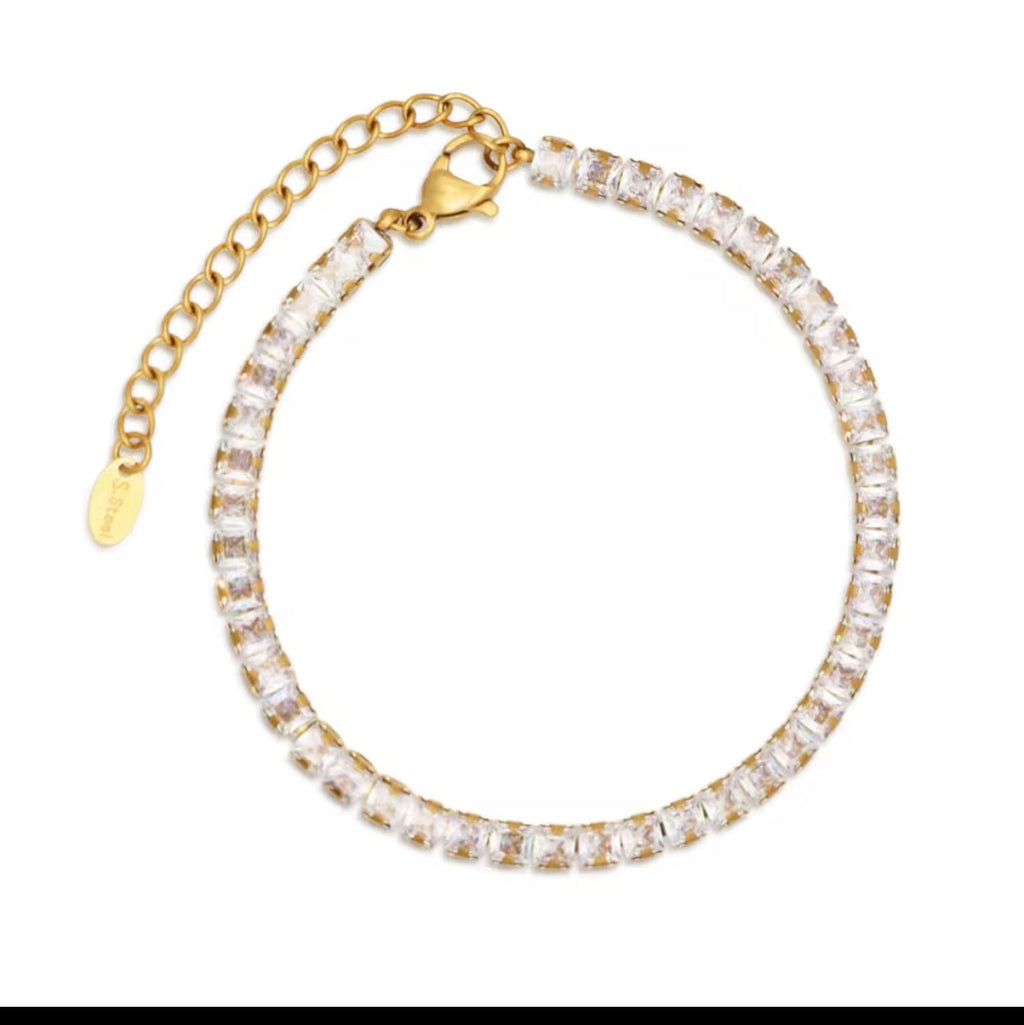 Signature Princess Cut CZ Bracelet
316L Stainless Steel • 18K PVD Gold